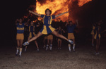 Cheerleader and Homecoming Bonfire by East Texas State University