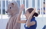 Cheering Student and Lucy the Lion by East Texas State University