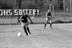 Soccer Player and Ball by East Texas State University