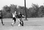 Soccer Players Vying for the Ball by East Texas State University