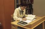 Student Studying in Library by East Texas State University