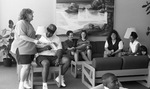 Students in Whitley Residence Hall Lounge by East Texas State University