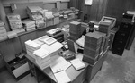 Desk Piled with Boxes in University Print Shop by East Texas State University