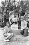 Sigma Tau Delta with Resting Lion Statue and Wreath by East Texas State University