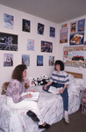 Two Students on Dorm Room Bed by East Texas State University