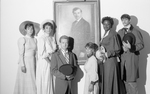 Group in Period Costume Standing in Front of William Mayo Portrait by East Texas State University